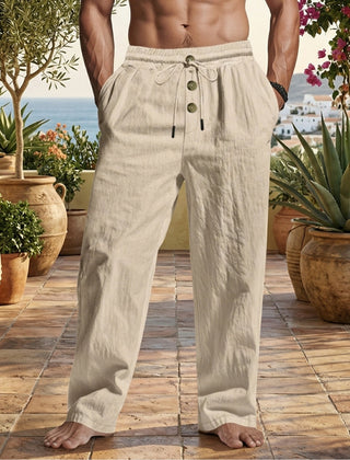 Pantaloni uomo beige dalla linea morbida con tasche laterali e vita elastica