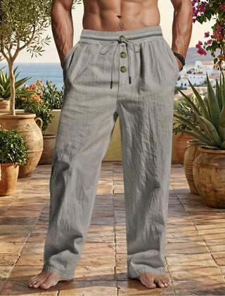 Pantaloni uomo grigi a gamba larga con coulisse in vita e bottoni a vista