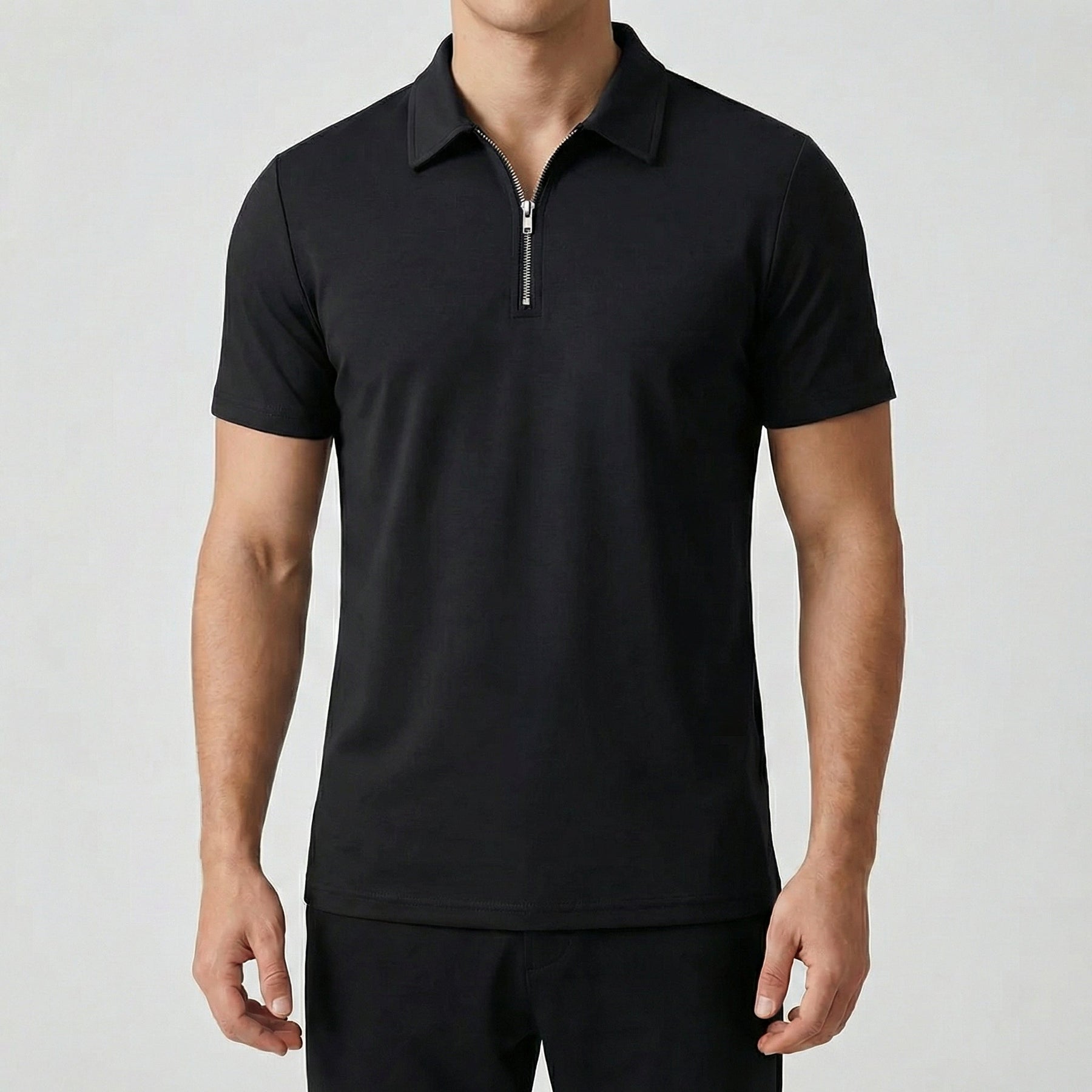 Polo uomo nera con colletto rigido e chiusura a mezza zip