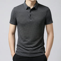 Polo uomo grigio scuro con texture a nido d'ape e colletto classico