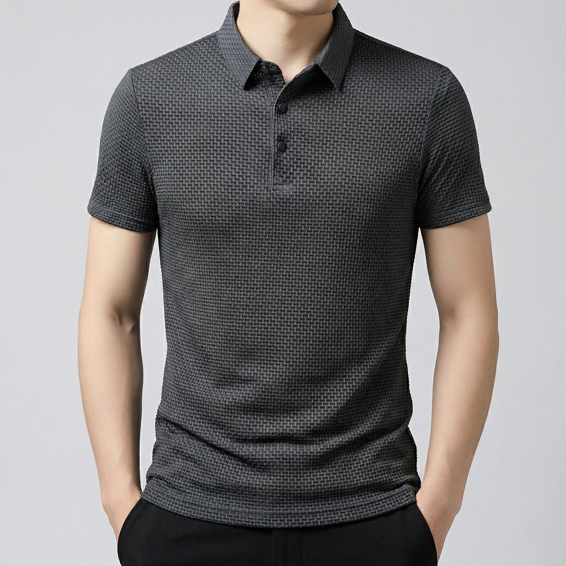 Polo uomo grigio scuro con texture a nido d'ape e colletto classico