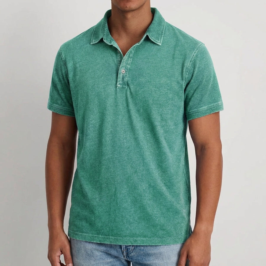 Polo uomo verde effetto delavé con colletto morbido e abbottonatura corta davanti