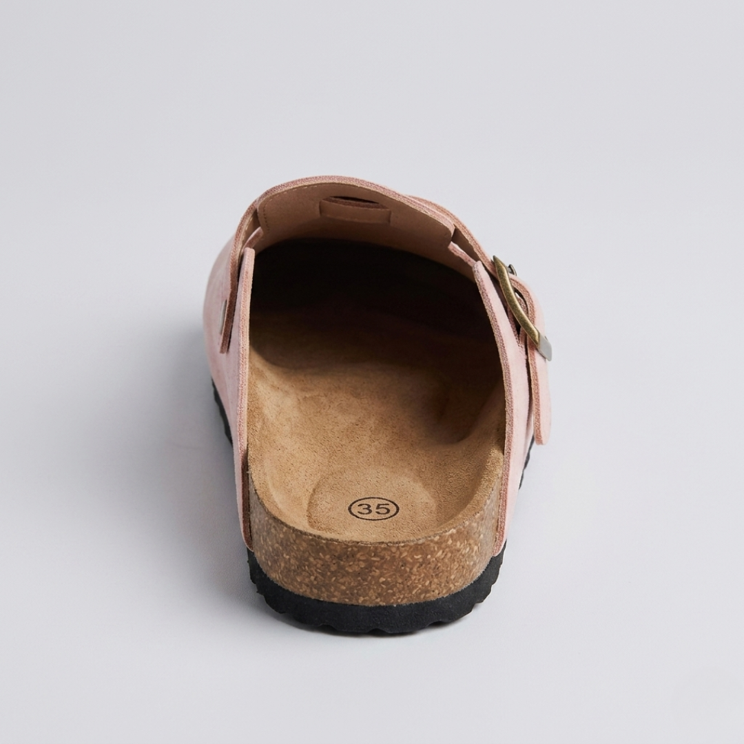 Retro del sabot rosa con sottopiede sagomato e tallone completamente aperto