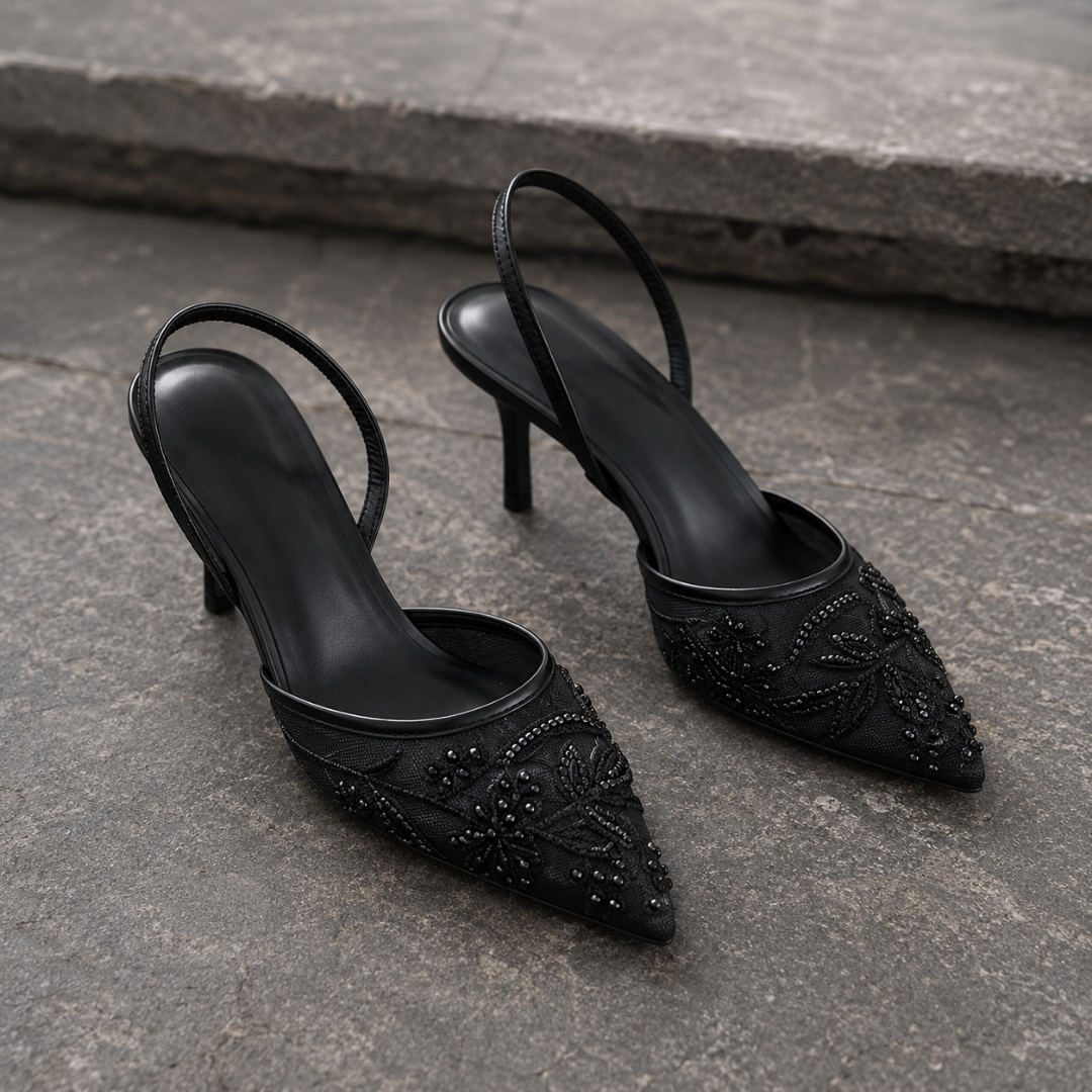 Slingback nere con ricamo floreale tono su tono, punta affusolata e tacco a spillo