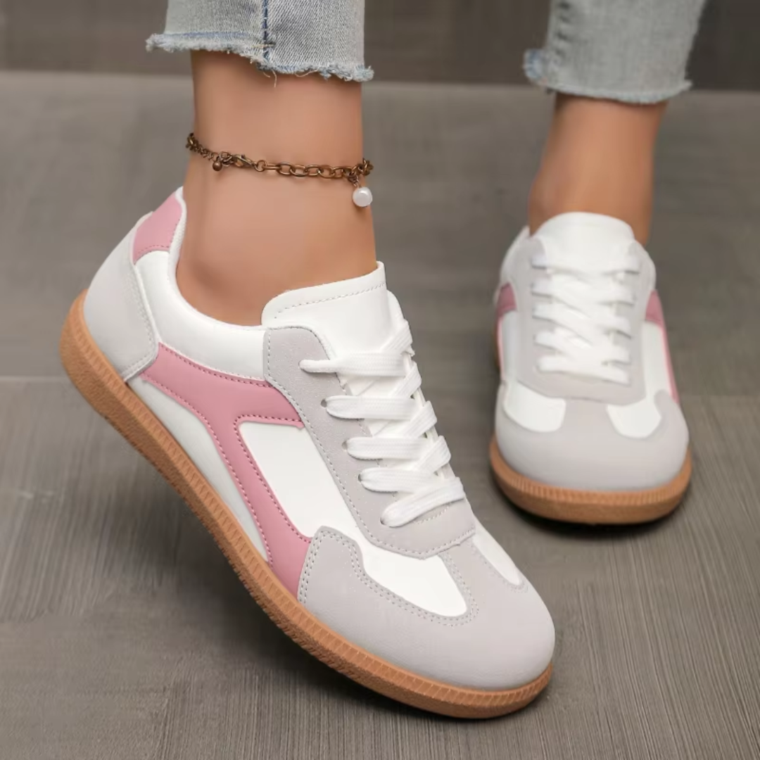 Sneakers donna bianche con inserti rosa e grigi, lacci bianchi e punta tonda