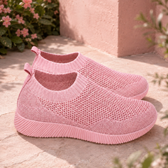 Sneakers donna rosa chiaro senza lacci con piccoli fori e linguetta posteriore
