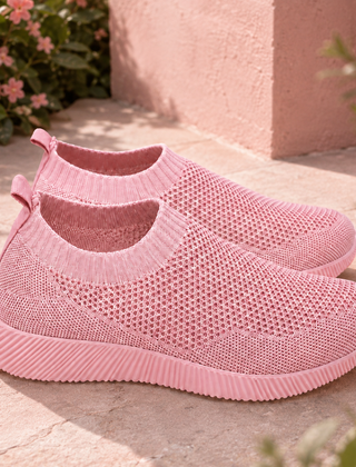 Sneakers donna rosa chiaro senza lacci con piccoli fori e linguetta posteriore