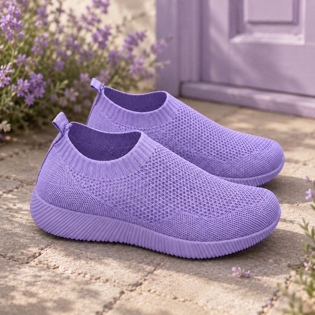 Sneakers slip on viola con bordo a coste, linguetta posteriore e suola bassa