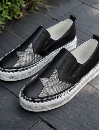 Sneakers slip-on donna nere con stella di strass e suola platform bianca