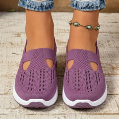 Sneakers donna viola slip-on viste frontalmente con aperture a goccia e suola bianca
