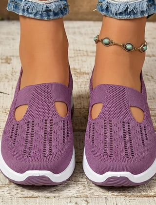 Sneakers donna viola slip-on viste frontalmente con aperture a goccia e suola bianca