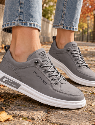 Sneakers donna grigie con lacci in tono e suola bianca a contrasto
