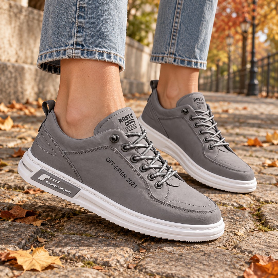 Sneakers donna grigie con lacci in tono e suola bianca a contrasto