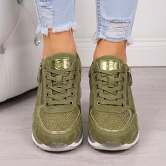 Sneakers donna verdi con lacci tono su tono e inserti lucidi sulla linguetta
