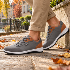Sneakers uomo grigie con inserti cognac a contrasto e suola bianca