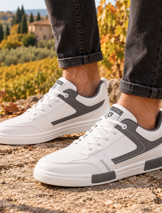 Sneakers uomo bianche e grigie con inserti a contrasto e chiusura con lacci