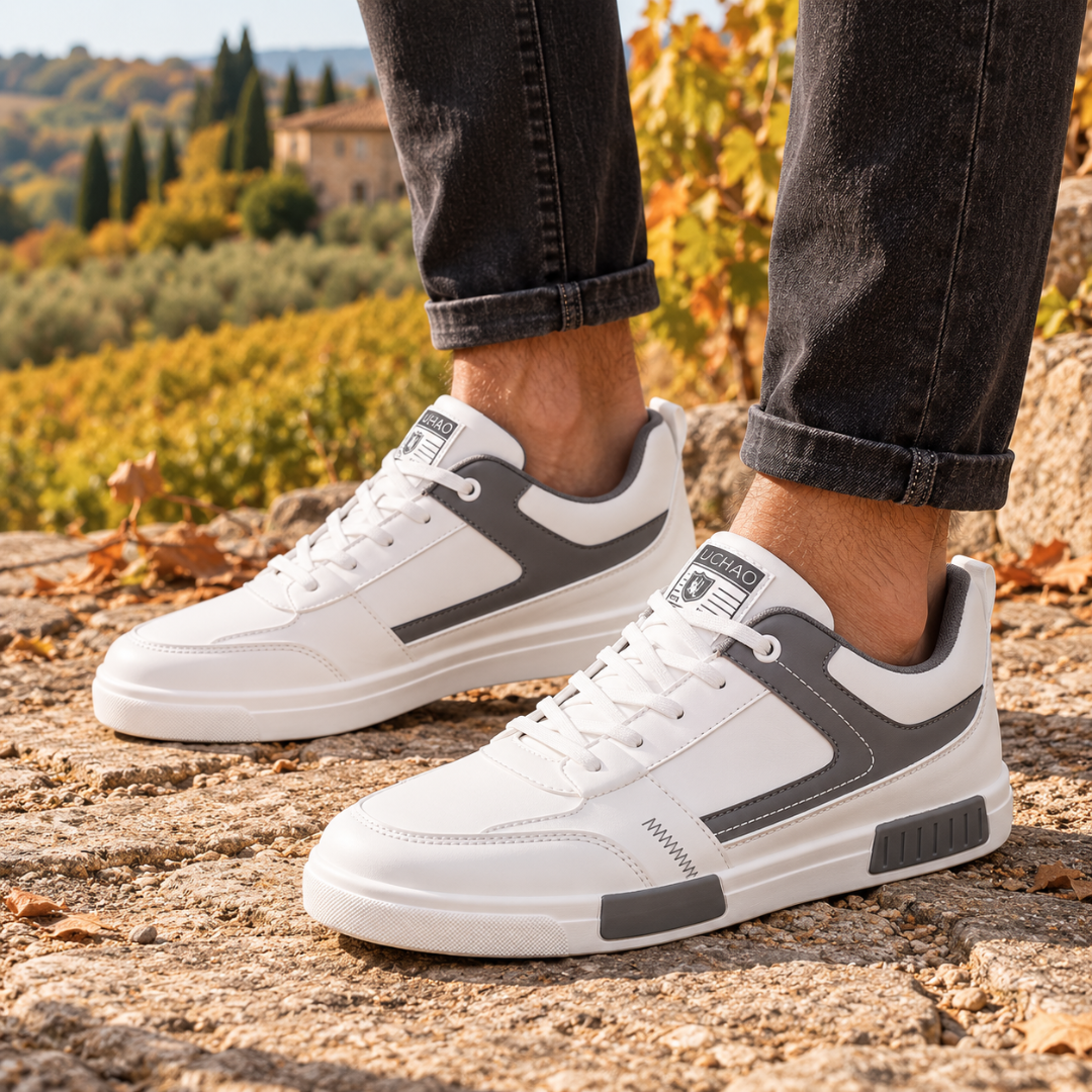 Sneakers uomo bianche e grigie con inserti a contrasto e chiusura con lacci