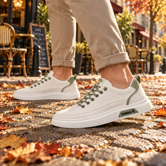Sneakers uomo verde chiaro basse con tomaia goffrata e lacci a contrasto