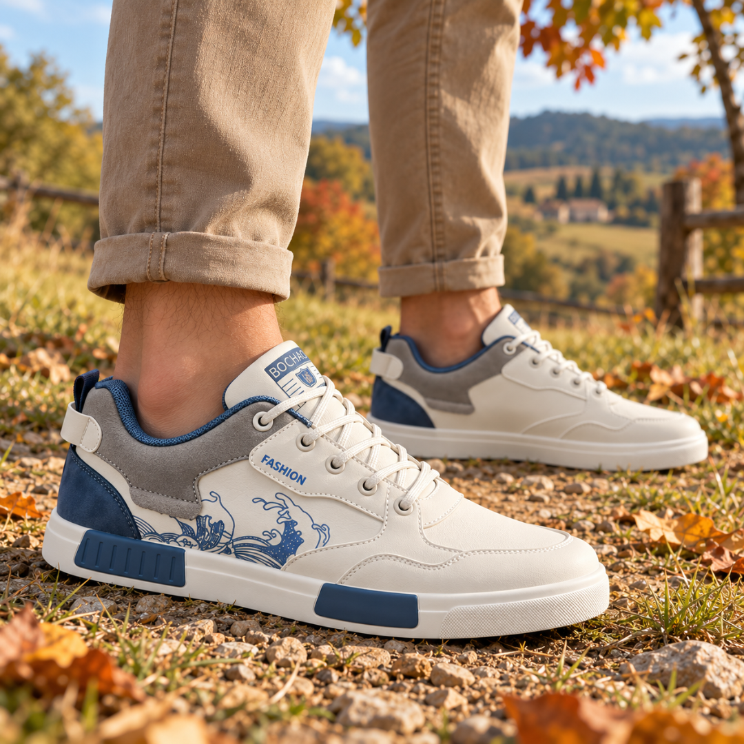 Sneakers uomo bianche viste di lato con tallone grigio e inserto blu