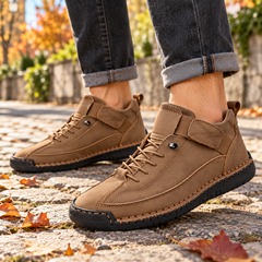 Sneakers uomo marroni con strappo laterale e cuciture a contrasto sulla tomaia