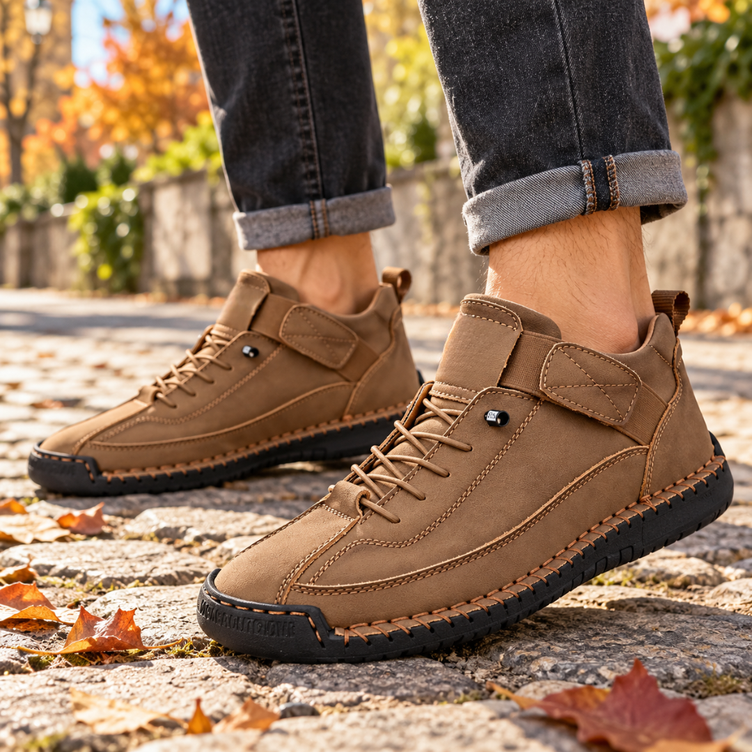 Sneakers uomo marroni con strappo laterale e cuciture a contrasto sulla tomaia