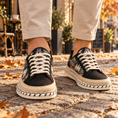 Sneakers nere da uomo con allacciatura bianca e bordo intrecciato sulla suola