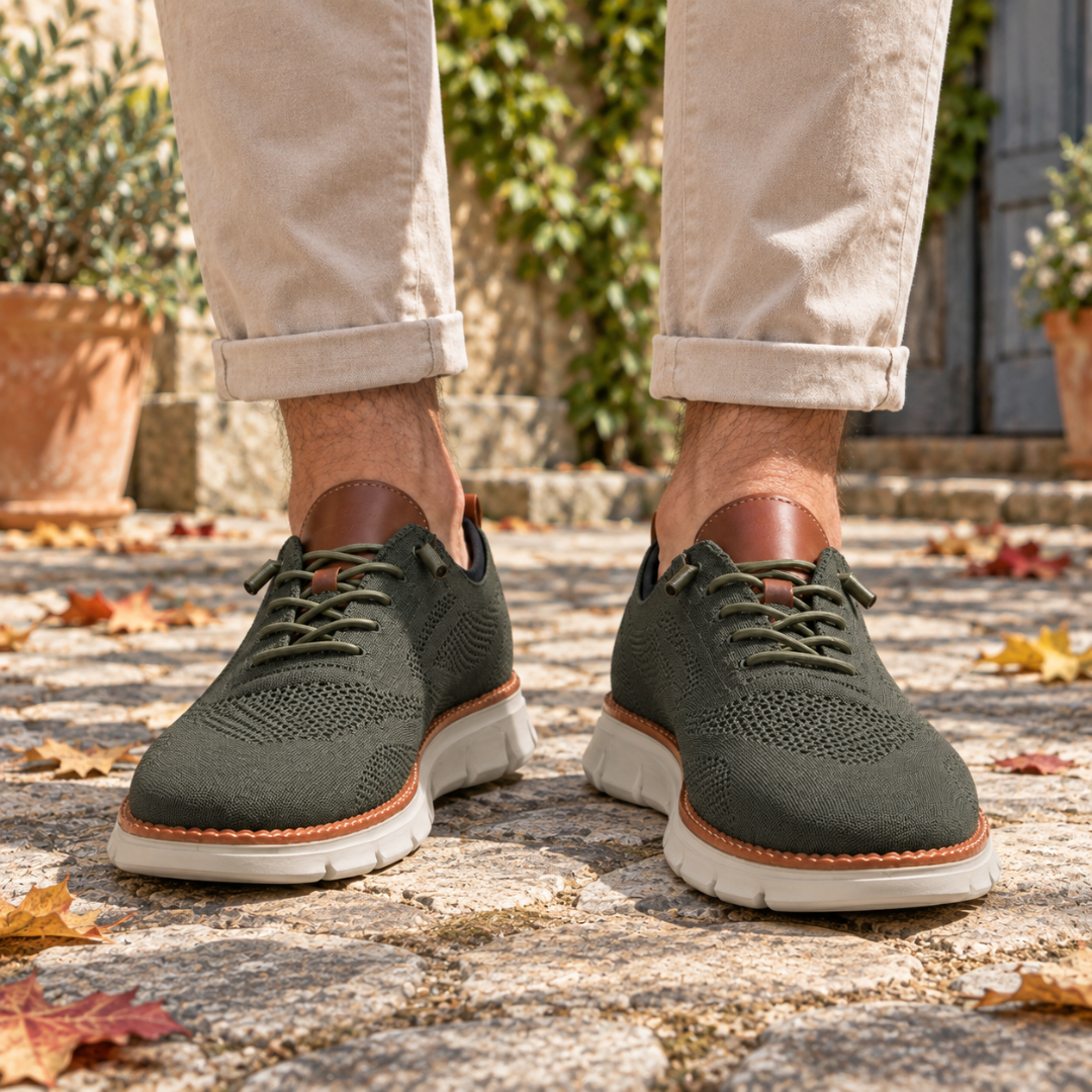 Sneakers uomo verdi in maglia traforata con lacci in tinta e suola bianca