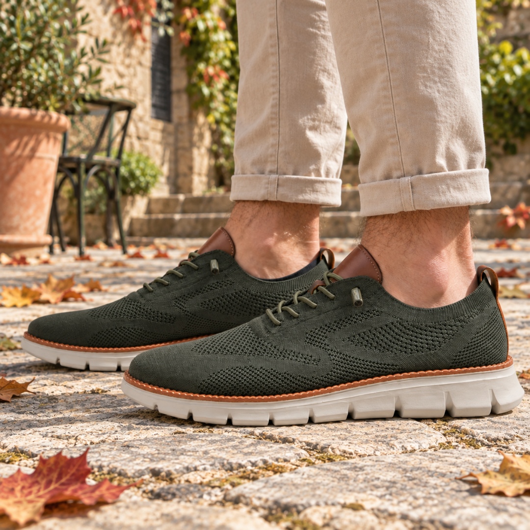 Sneakers verdi uomo viste di lato con talloniera marrone e suola scanalata