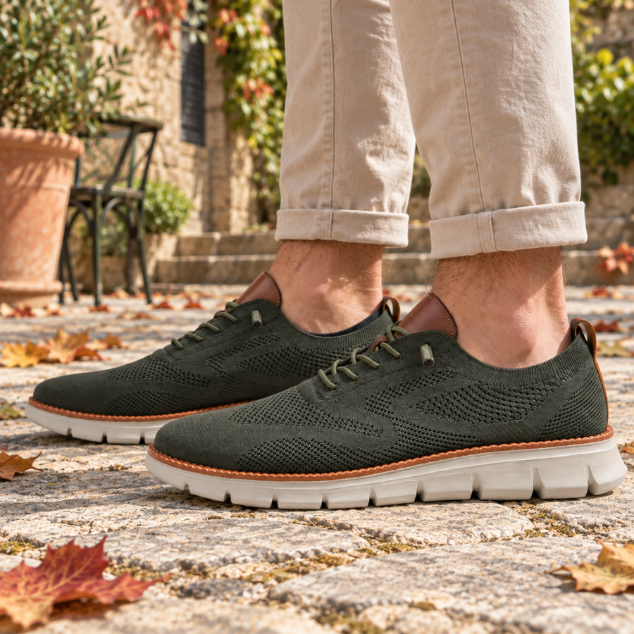 Sneakers verdi uomo viste di lato con talloniera marrone e suola scanalata