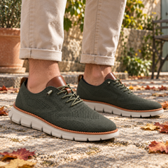 Sneakers uomo verdi stringate con motivi traforati sulla tomaia in maglia