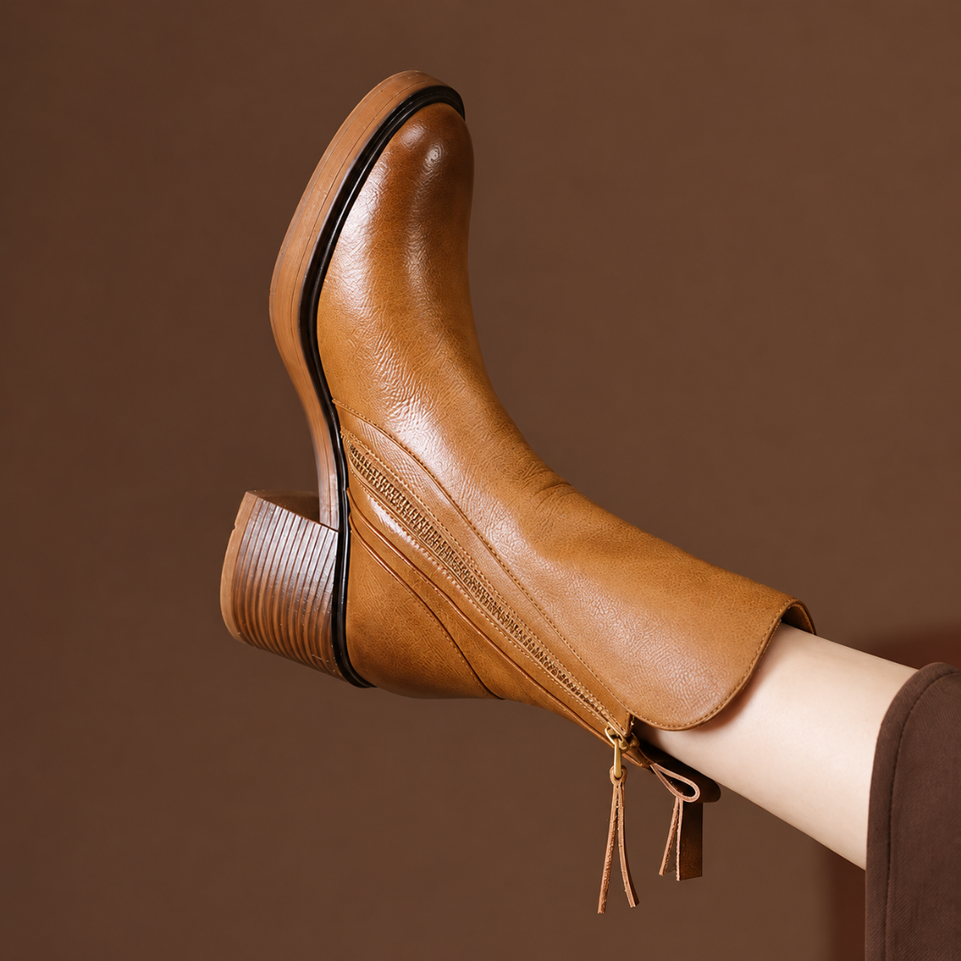 Stivaletto donna marrone con zip laterale e nappine, tacco largo squadrato