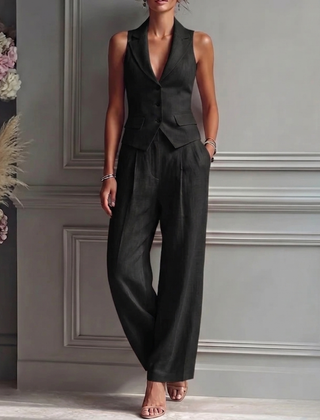 Tailleur donna nero con gilet sartoriale senza maniche e pantalone a vita alta