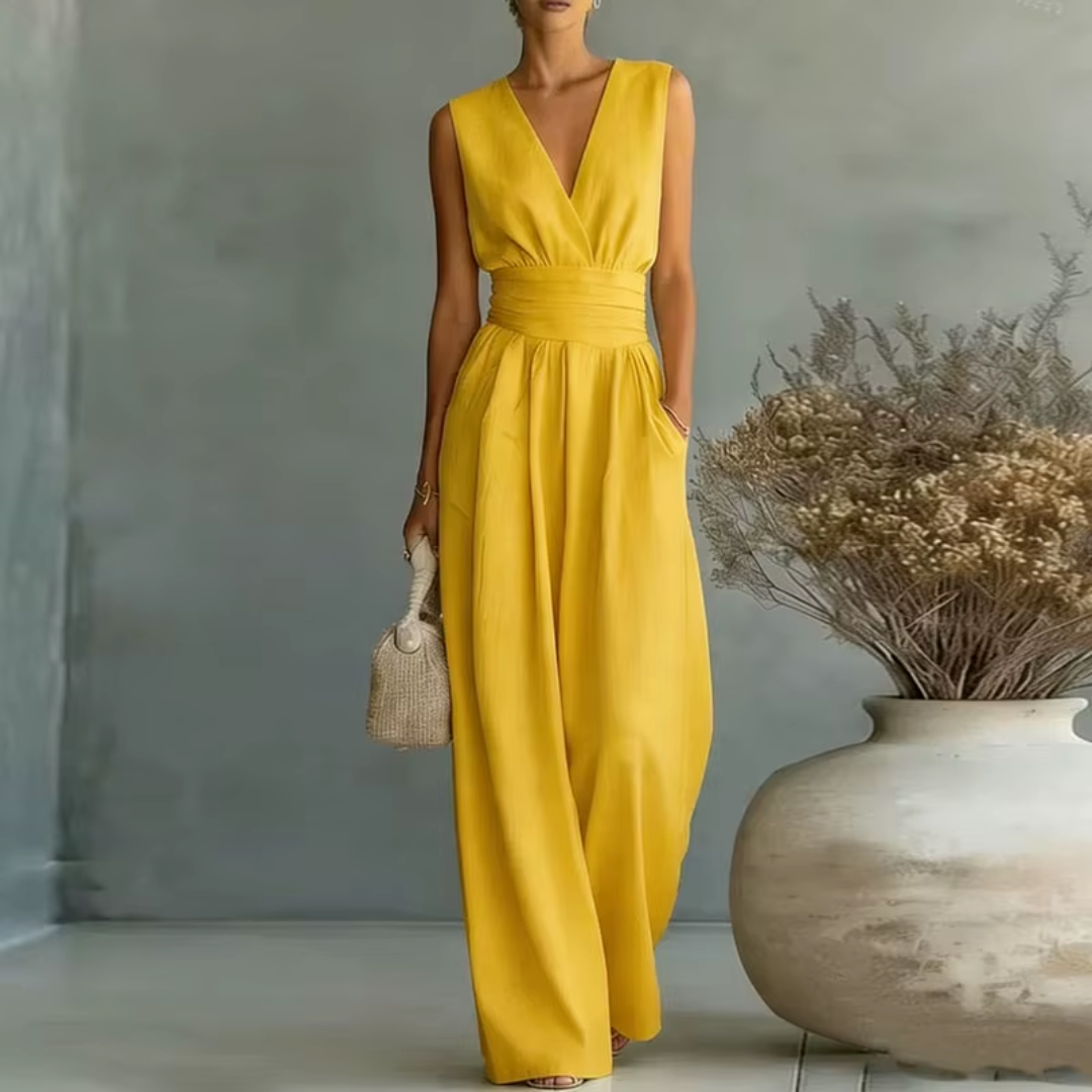 Tuta gialla senza maniche con pantaloni ampi e tasche laterali, look luminoso