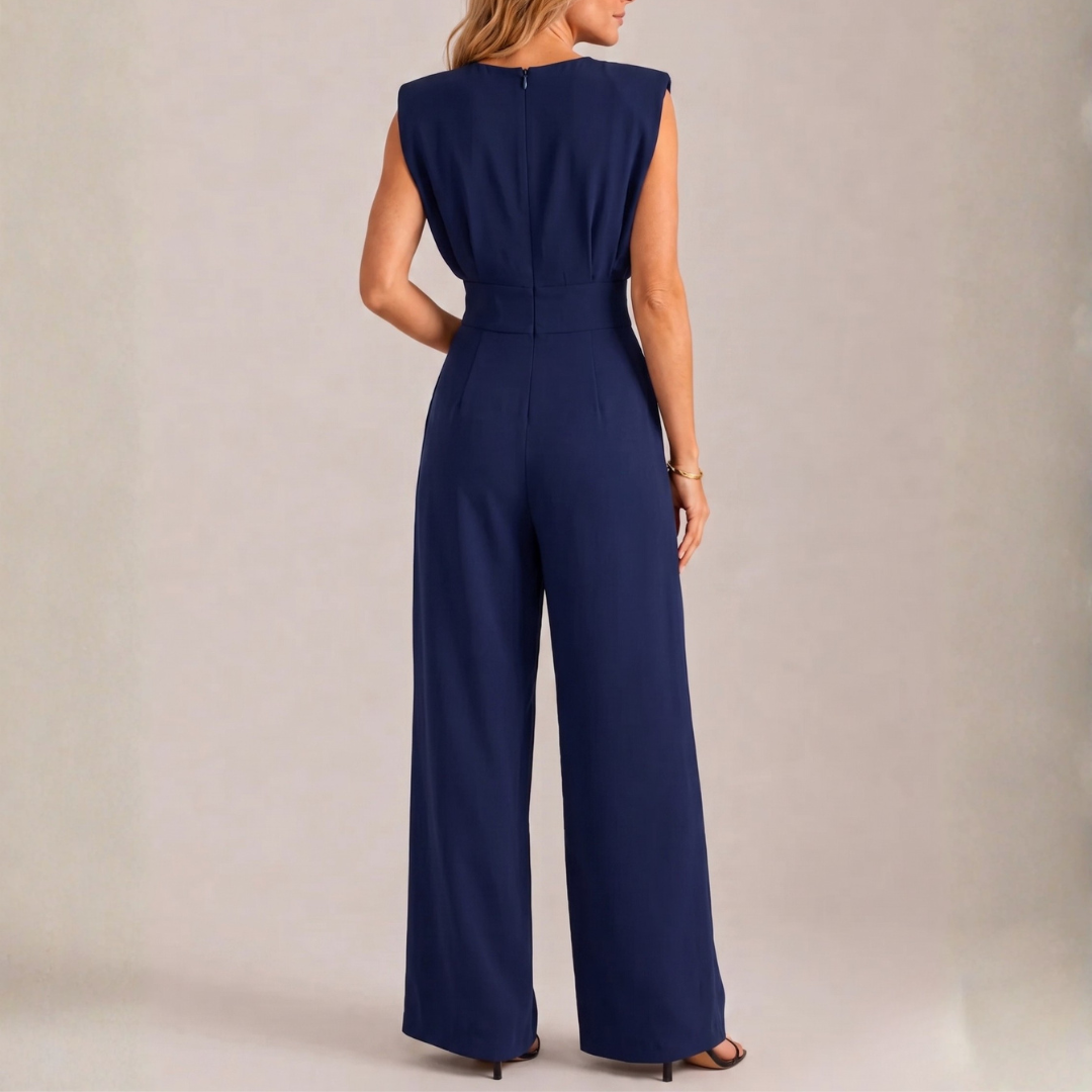 Retro della tuta blu navy con fascia in vita e pantalone fluido