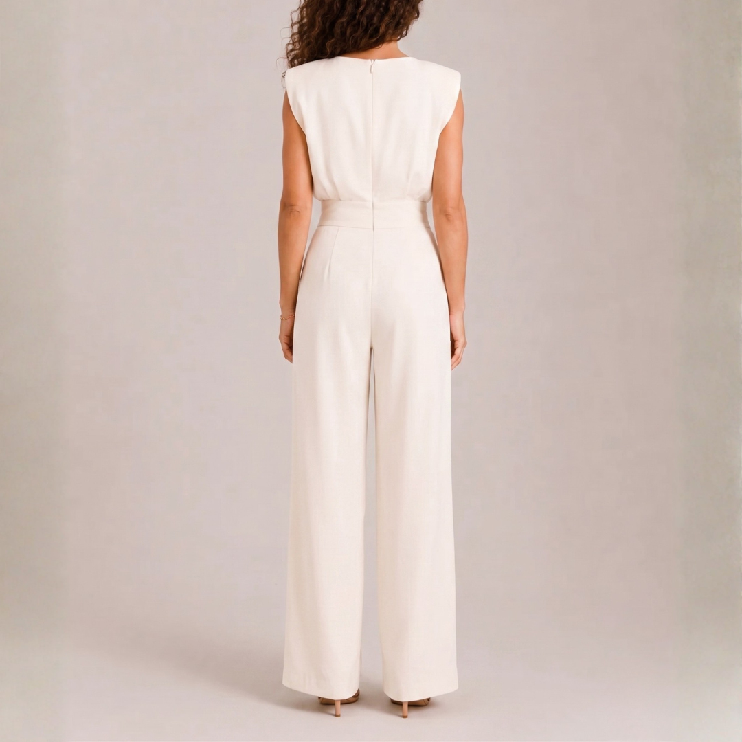 Retro della tuta crema con spalle strutturate e zip centrale