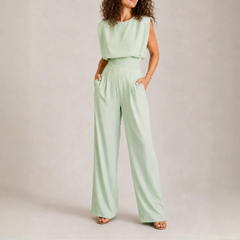 Tuta donna verde menta senza maniche con vita alta e pantalone a gamba larga