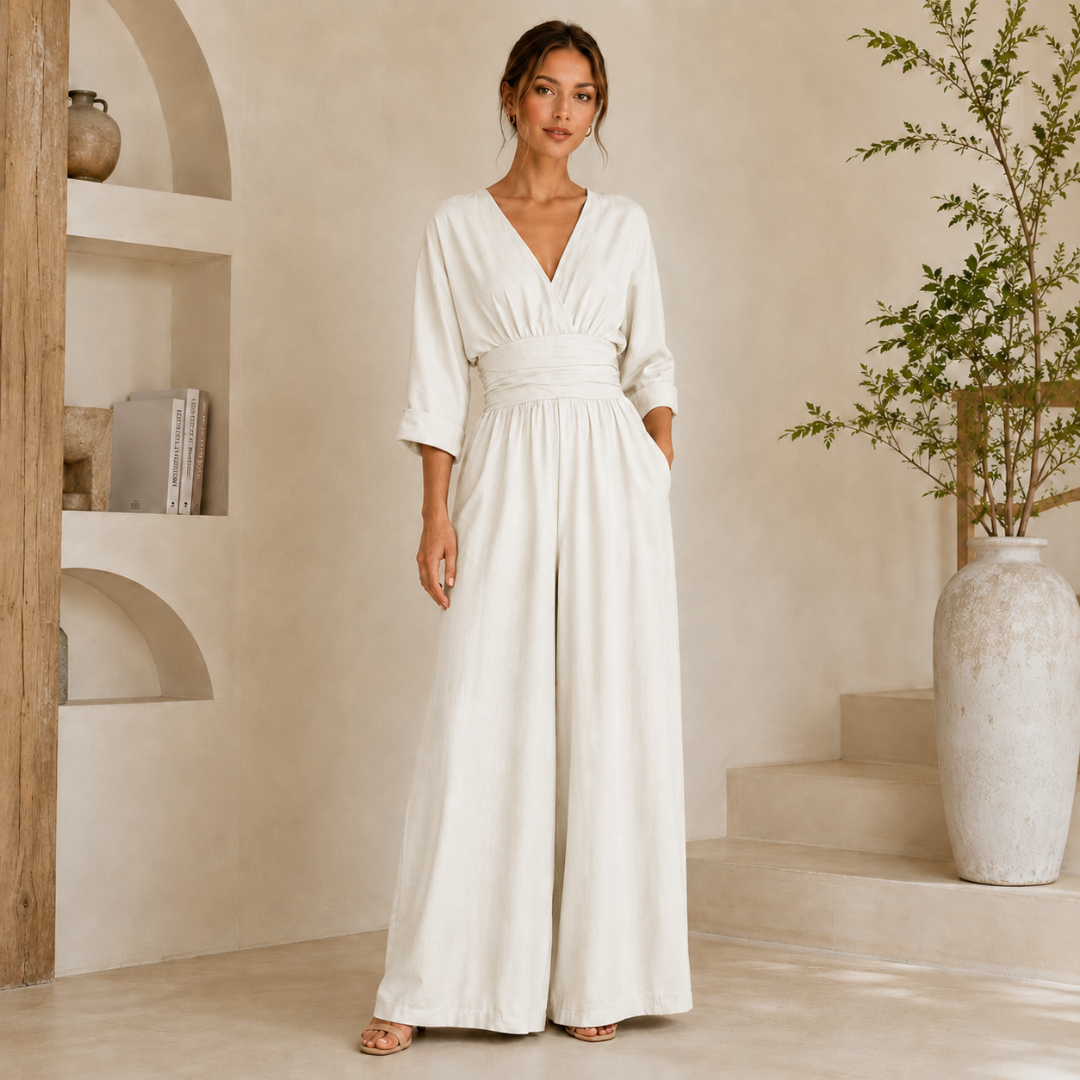 Tuta donna bianca lunga con scollo a V e pantalone a gamba larga
