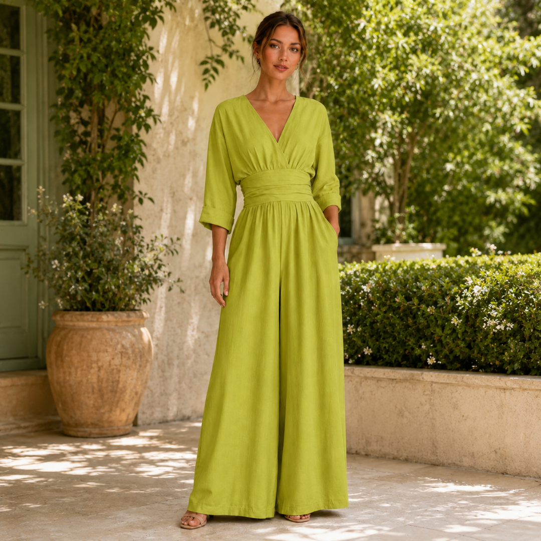Tuta verde chiaro lime con gamba larga fluida e tasche laterali discrete
