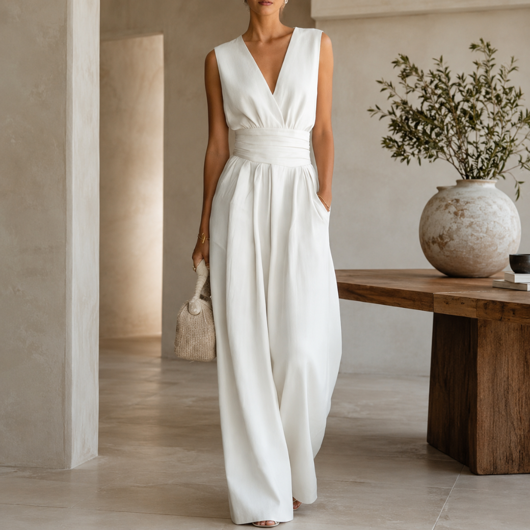 Tuta bianca donna senza maniche con scollo a V e fascia drappeggiata in vita