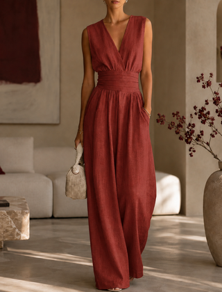 Tuta rossa donna senza maniche con fascia drappeggiata e pantaloni ampi