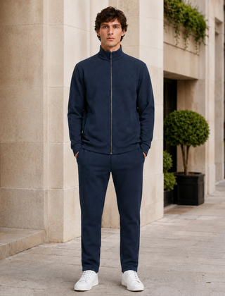 Tuta sportiva uomo blu navy con giacca a collo alto e zip integrale