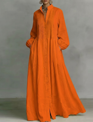 Vestito lungo arancione a camicia con maniche a palloncino e tasche laterali