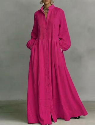 Vestito lungo fucsia con corpetto plissettato verticale e gonna molto ampia