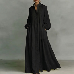 Vestito lungo nero a camicia con nervature sul busto e ampia gonna fluida