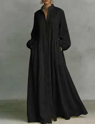 Vestito lungo nero a camicia con nervature sul busto e ampia gonna fluida