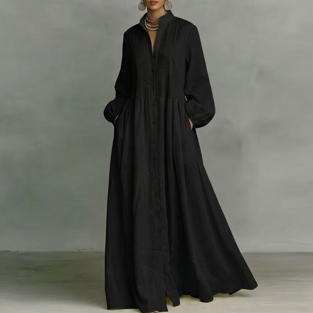 Vestito lungo nero a camicia con nervature sul busto e ampia gonna fluida