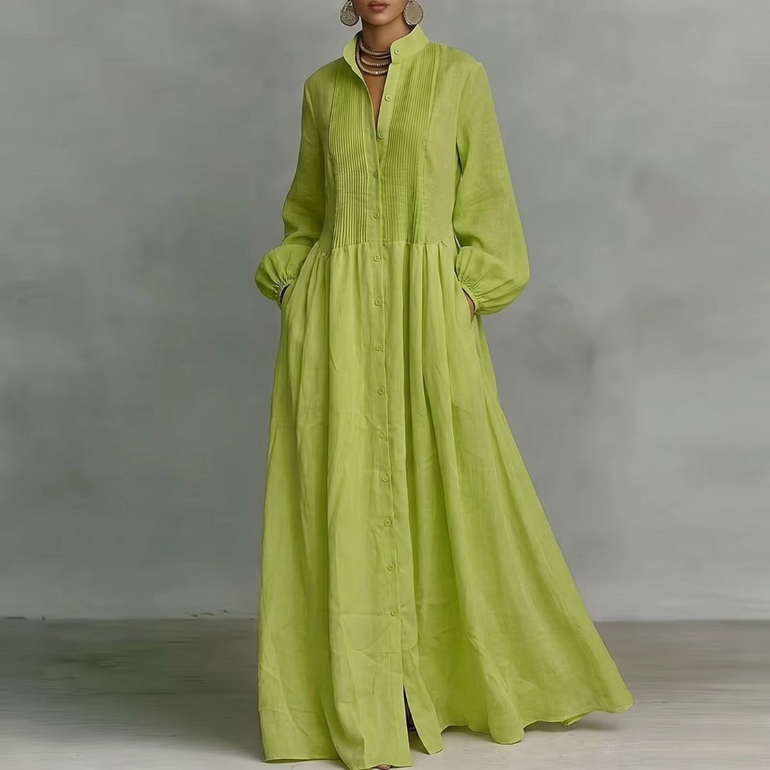 Vestito lungo verde chiaro a camicia con nervature verticali sul corpetto e bottoni frontali