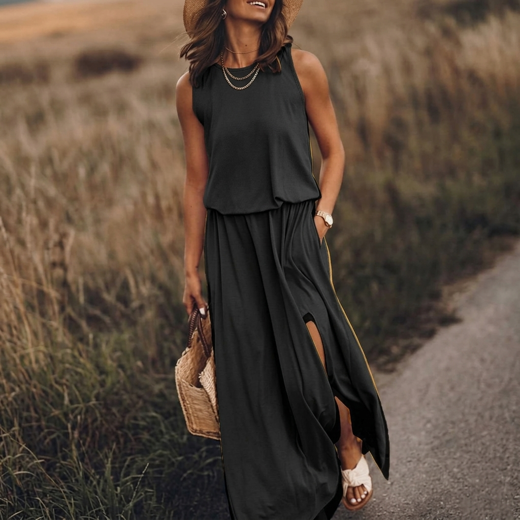 Vestito lungo nero senza maniche con vita arricciata e spacco sulla gonna