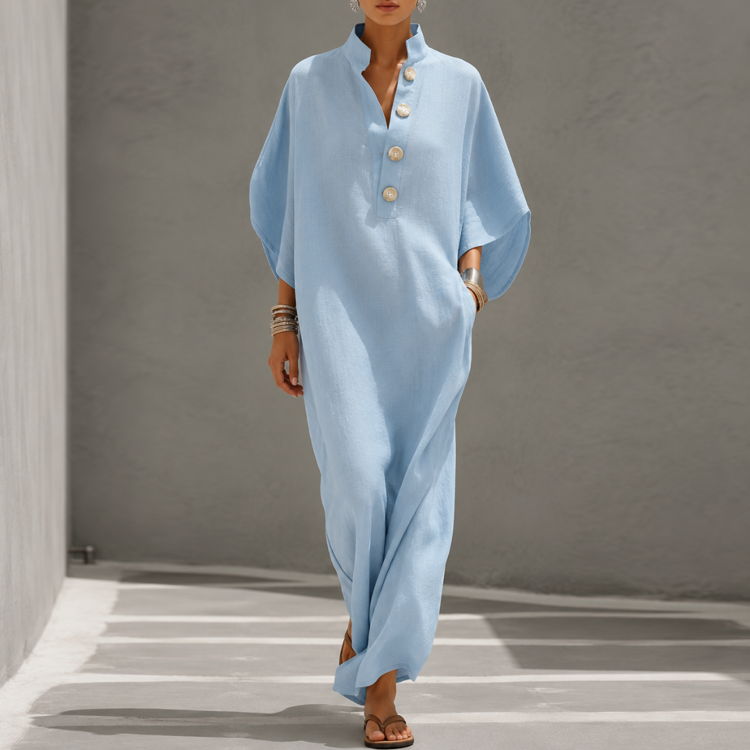 Vestito lungo azzurro oversize con collo coreano, bottoni chiari e maniche ampie