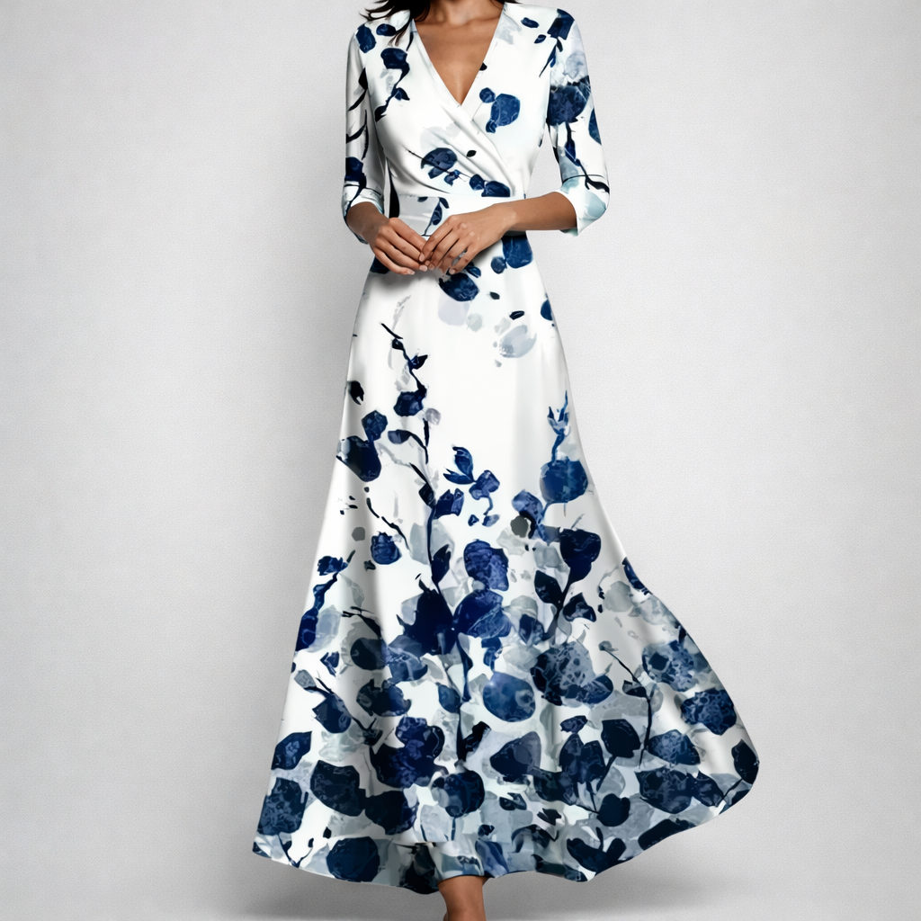 Vestito lungo bianco con fiori blu sfumati e scollo a V incrociato